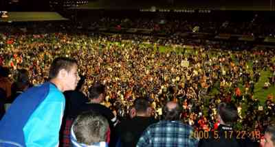 The crowd is very much on the pitch